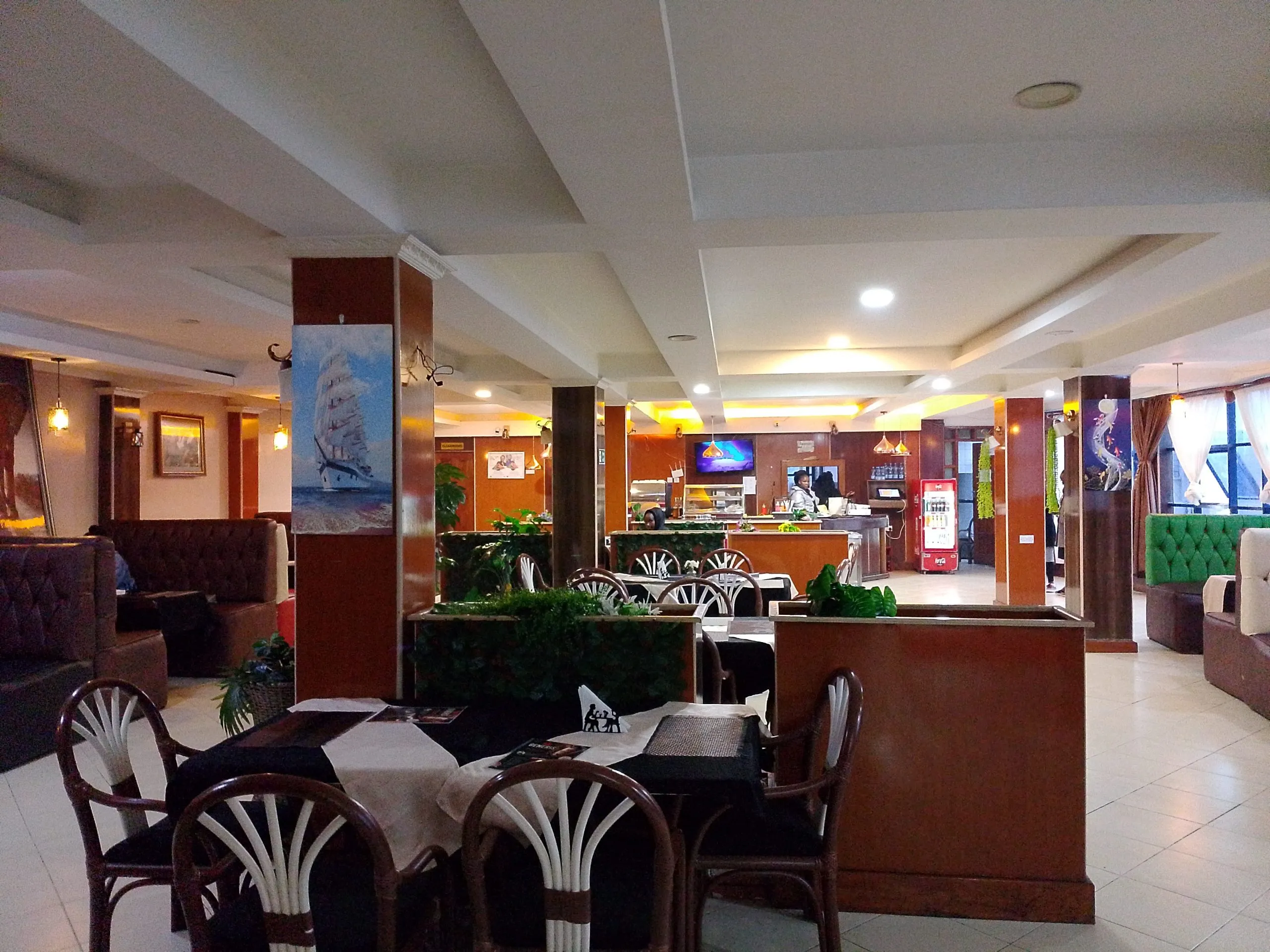 The restaurant dining room at Generis Hotel, laid for service
